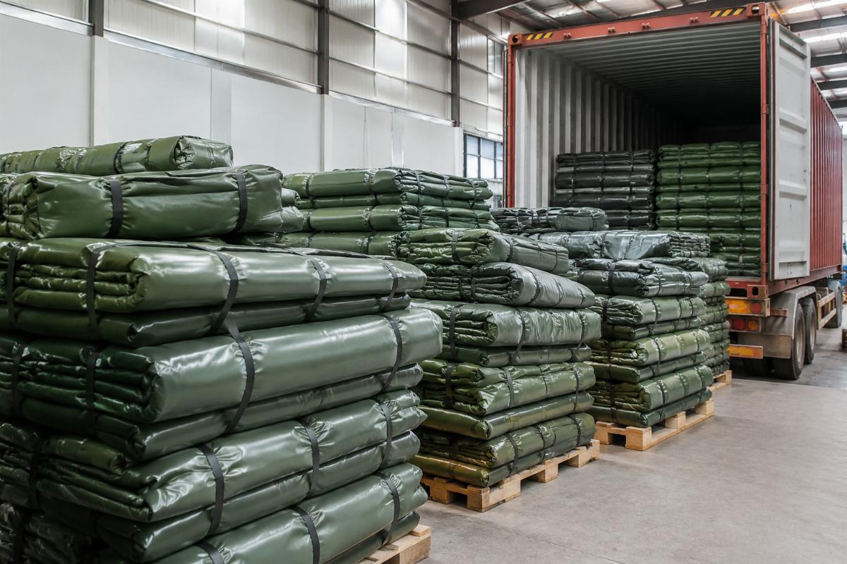 Finished custom 1000D PVC coated fabric products ready for container shipping