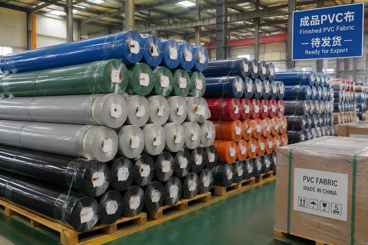Finished PVC fabric rolls stacked in a factory warehouse ready for export shipping